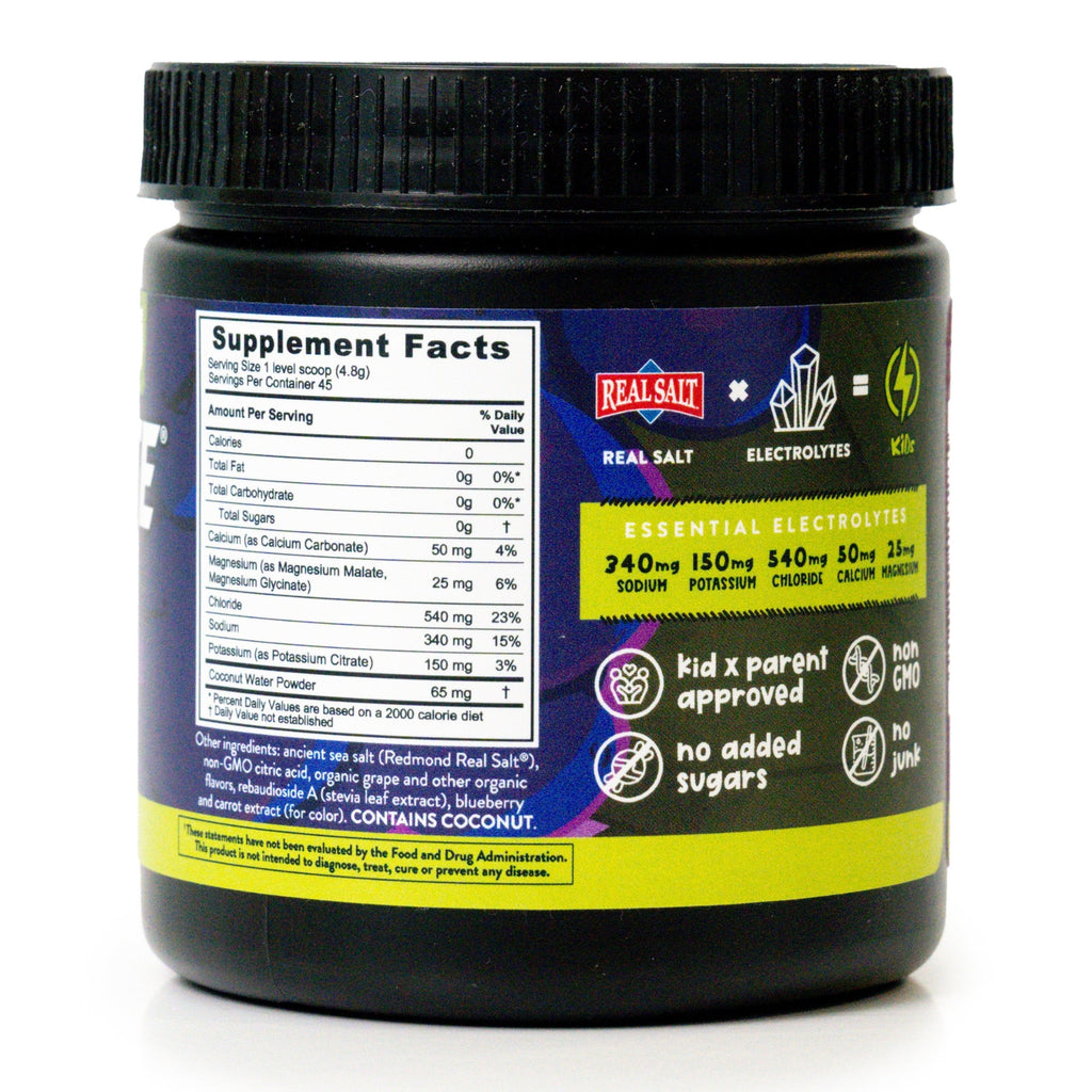 Black plastic bottle of Real Salt brand electrolyte supplement displaying the nutrition facts label. 
