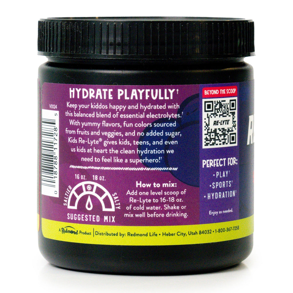 Black plastic jar of Redmond Re-Lyte Kids Electrolyte Mix showing nutritional information and mixing instructions. 
