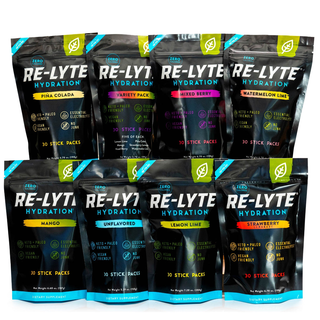 Eight flavor options of Re-Lyte Hydration 30 count stick packs electrolyte powder on white background. Flavors including: Piña Colada, Variety Pack, Mixed Berry, Watermelon Lime, Mango, Unflavored, Lemon Lime and Strawberry Lemonade.